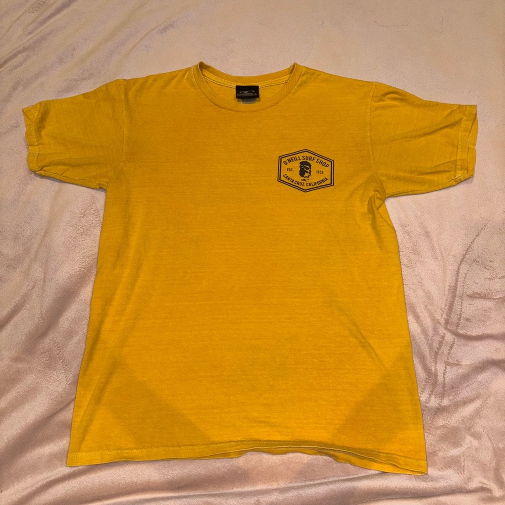 Woman’s small yellow o’neil surf shop tee